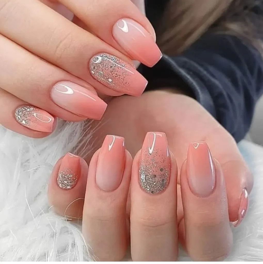 This elegant wedding nail design showcases a top 2025 trend with a beautiful ombre base and a sparkling glitter fade.